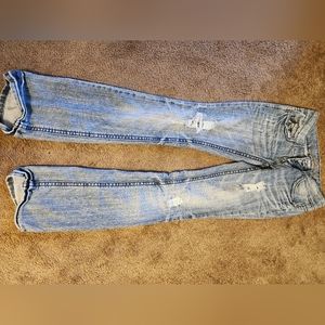 Almost famous light blue, ripped jeans.